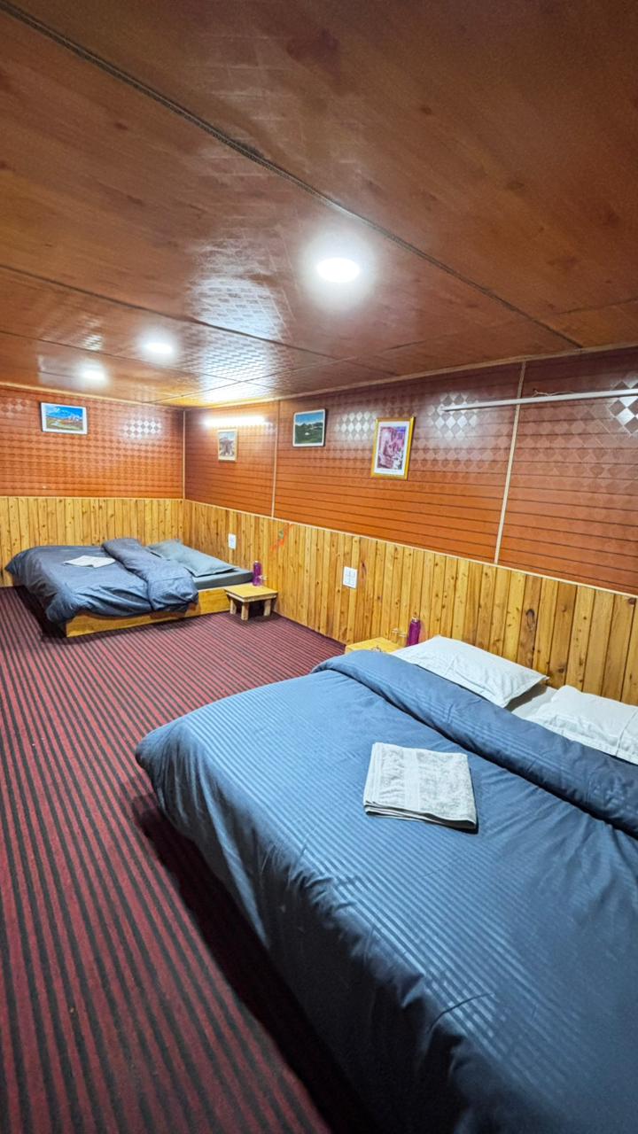 Larger bedroom at Zenden Stays Jibhi