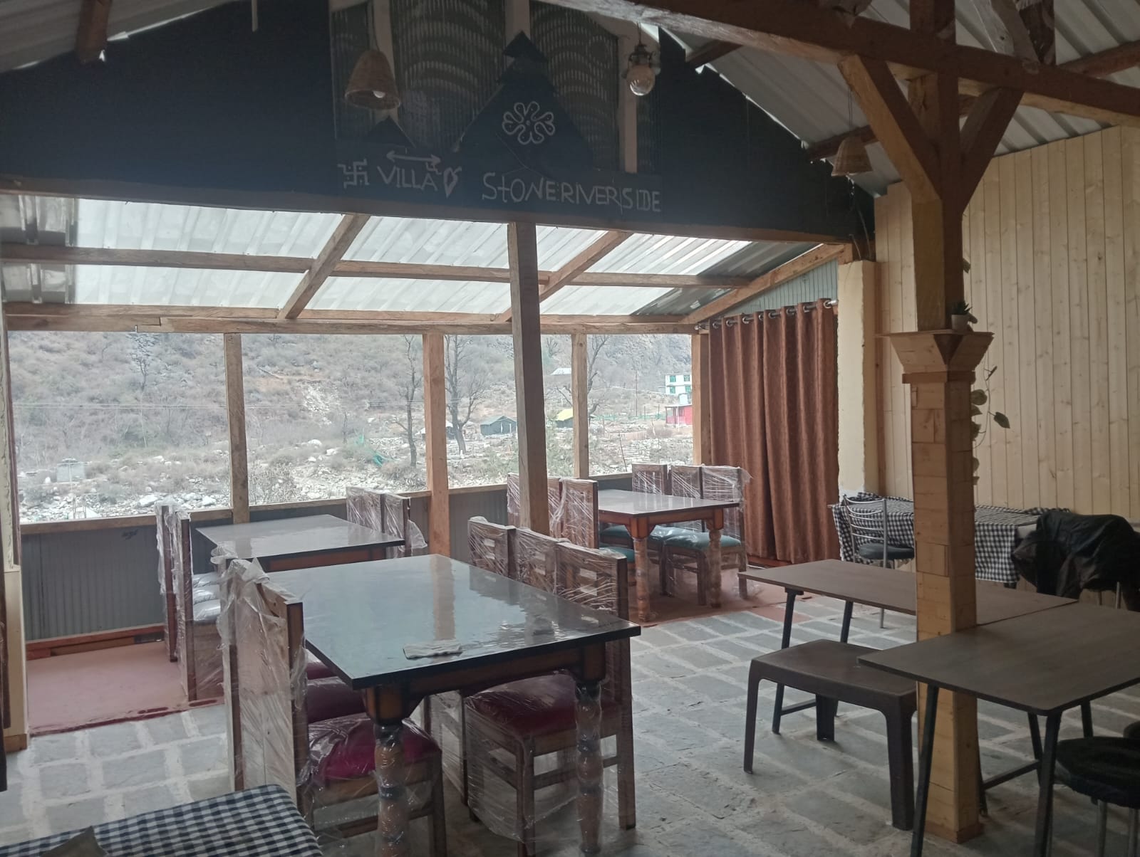 Shared dining space at Villa Stone Riverside Homestay