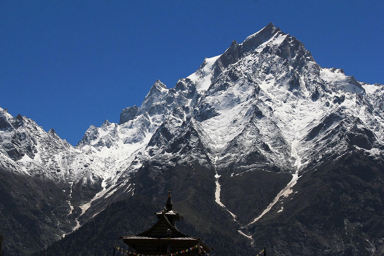 Kinnaur Kailash Shivling above the roof of a Kalpa temple