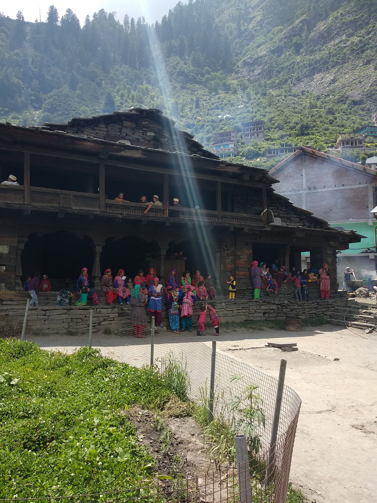 Traditional buildings and mountains at Malana Village