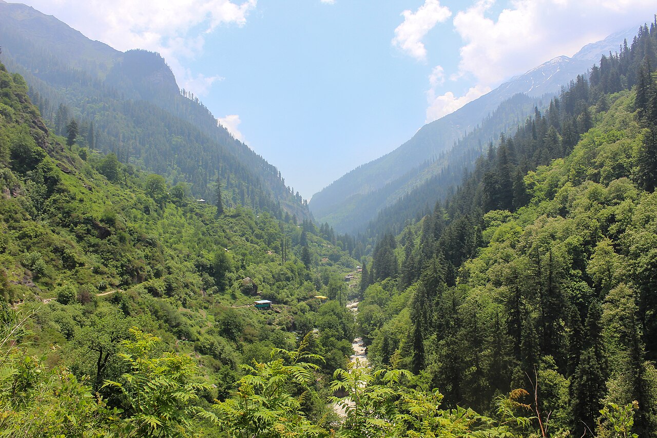 A mountain stream winding through the upper Parvati Valley
