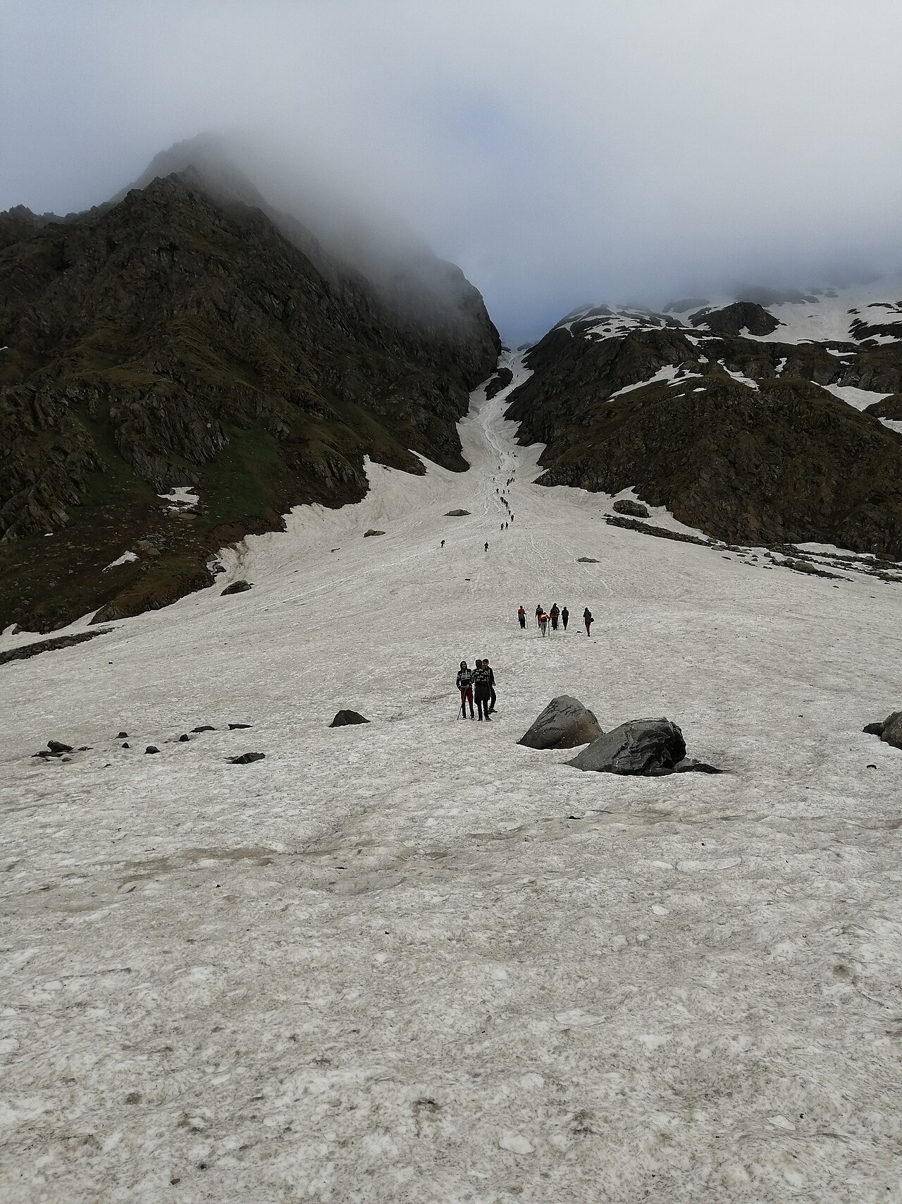 Steep mountain terrain above Parvati Bagh on the Shrikhand route